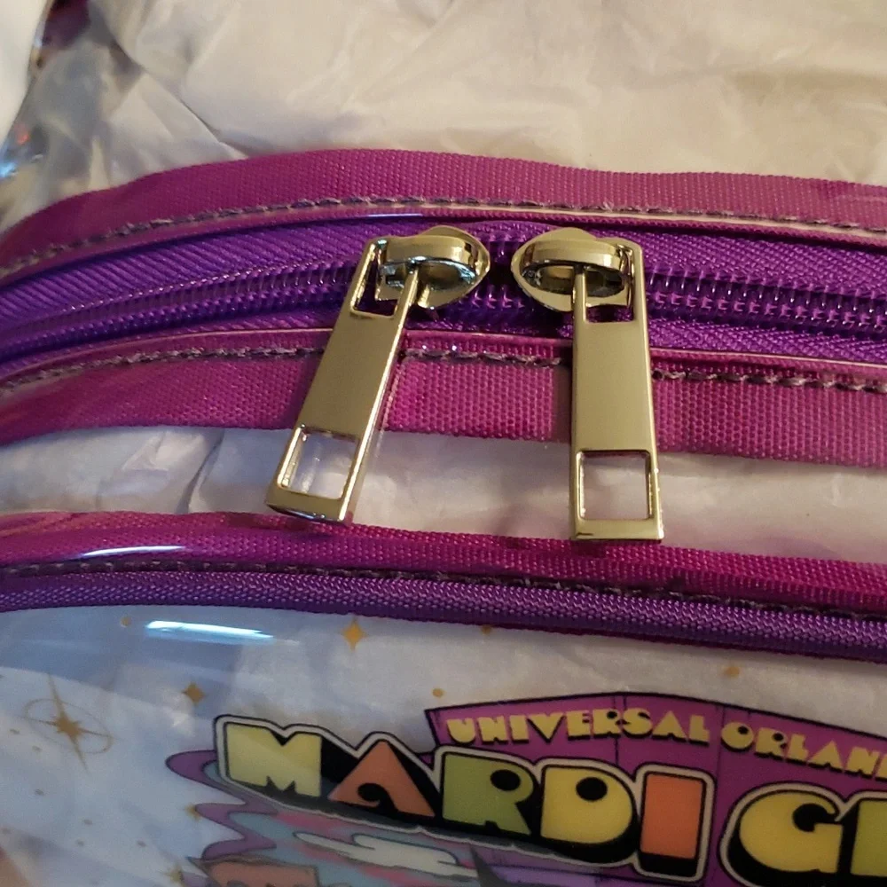 Universal Orlando‎ Transparent Mardi Gras 2024 Backpack. NWOT